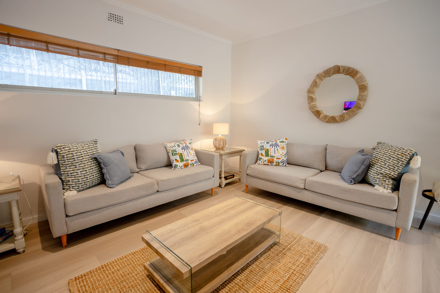 Two sofas and a coffee table in the renovated lounge