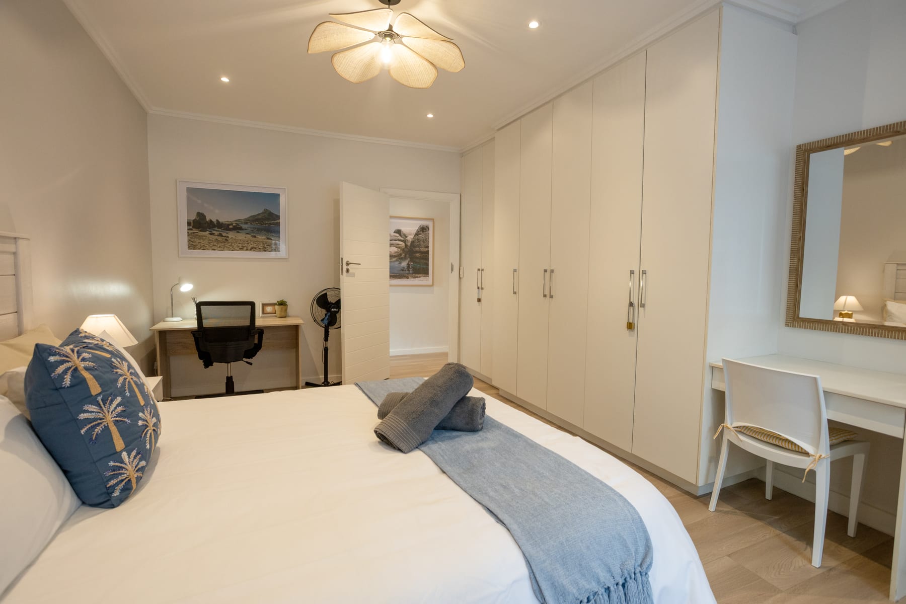 Main bedroom wardrobes, dressing table and workspace