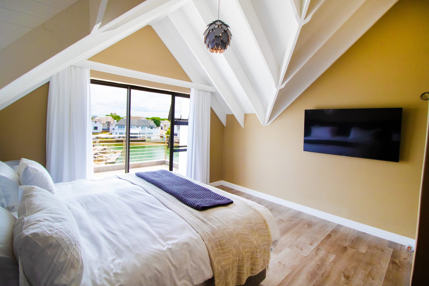 Fourth bedroom with canal-facing doors